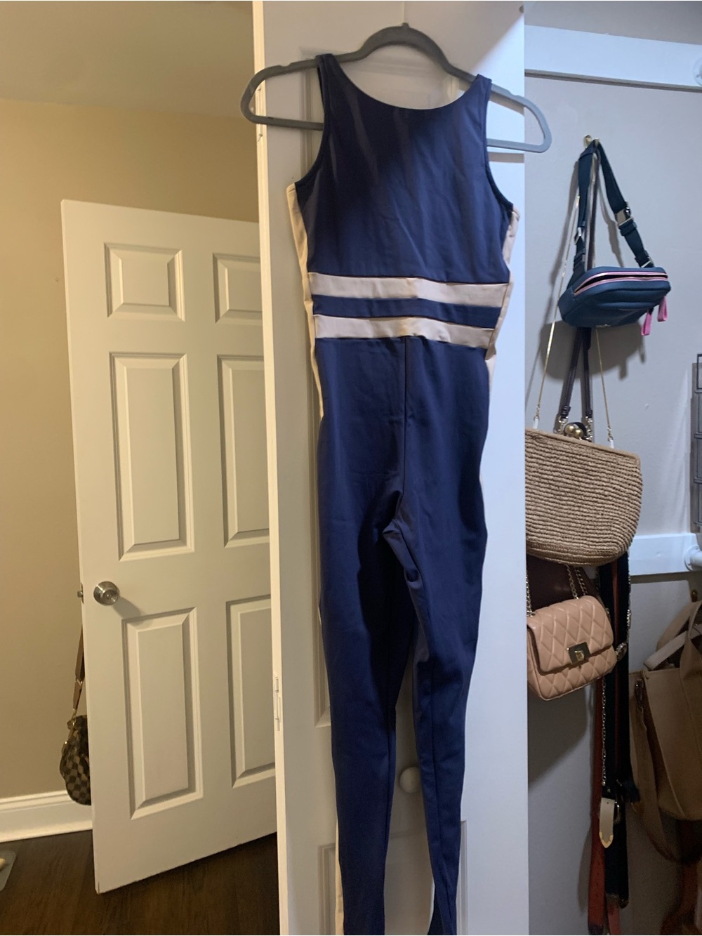 Sleeveless navy workout jumpsuit